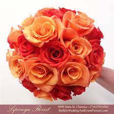 (may have to change color if unavailable and premium in larger bowl with more roses) this sweet arrangement with free spirit or similar coral colored roses and wax f. Peach Wedding Flowers Buffalo Wedding Event Flowers By Lipinoga Florist