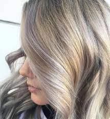 Black hair is perfect for bright blue hair streaks! How To Wear It Violet Blonde Hair Wella Professionals