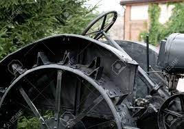 Add to favorites quick view antique cast metal wheels and axle. Antique Tractor Steel Wheel With Spikes Detail Stock Photo Picture And Royalty Free Image Image 11489135