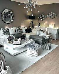 When we think about all the living rooms that we've been into, it's kinda rare to see a living room that focuses more on the black color. Living Room Decor Grey And White Home Decoration Design Ideas