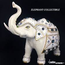 The elephant is delivered with a cleaning cloth, gloves, and a card describing the animal's character. Swarovski Crystal Elephant Collectible Elephant Sculpture Elephant Ceramic Elephant