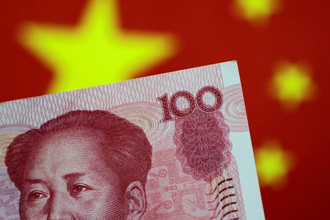 China uses yuan as olive branch in US trade talks | Reuters