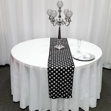 What kind of fabric is used for table runners? Satin Polka Dot Table Runners