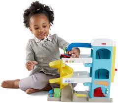 The 40+ year old fisher price parking ramp and service center was broken when my grand kids visited for christmas. Fisher Price Fhg50 Little People Car Park With 2 Wheelies Vehicles Toddler Toy From 18 Months Amazon De Toys Games