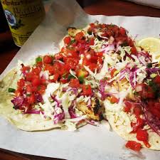 In a bowl, mix cayenne, garlic powder, cumin, salt, and pepper. Bear Flag Fish Co The Bear Garden