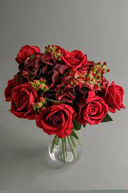 Placed in a liquid illusion vase, this arrangement is the perfect accent piece for a holiday centerpiece or coffee table vignette. Luxury Artificial Hydrangea Bouquet Red Hydrangeas Artificial Blueberry Street Flowers Silk Flowers