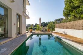 A landscape design for modern outdoor living. Modern Semi Detached House With Private Pool Guest Apartment And Sea Views Purchase