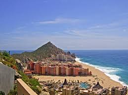 A climate graph showing rainfall, temperatures and normals. Cabo San Lucas Weather