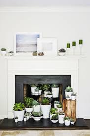 They usually stand on legs or placed on top of a pillar and you wouldn't have them attached to a wall. 20 Fireplace Decorating Ideas Best Fireplace Design Inspiration