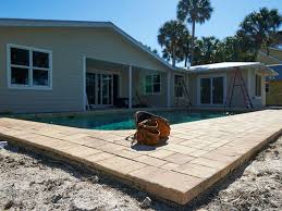Not only will an aluminum screen room help protect your outdoor addition and outdoor belongings, but it can increase the value of your home and give you more relaxing comfort. Concrete Patios Pavers Slabs Stem Walls Sarasota Tampa