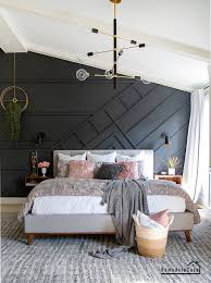 This farmhouse style master bedroom features a warm wood ceiling and traditional mullioned windows. A Mid Century Modern Master Bedroom Reveal Remodelando La Casa