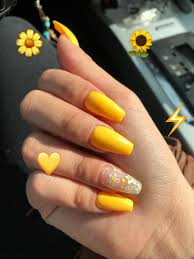 You're meant to take risks with your long nails, and instead of playing it safe with neutral, round nails, go for vibrant colors and accents that will command. Yellow Coffin Nails Nails Coffin Nails Crystal Nails