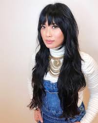 These bangs are cut into the rest of the hair with long layers. 23 Perfectly Flattering Long Hairstyles With Bangs Stylesrant