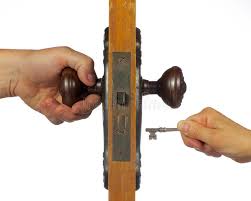 Identify the position of the lock. Old Antique Door Being Open With Skeleton Key Stock Image Image Of Mystery Locking 25868473