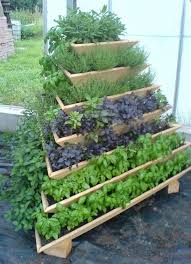 20 Diy Tower Garden Ideas To Grow Plants In A Small Space Vertical Garden Vegetable Garden Design Vertical Herb Garden
