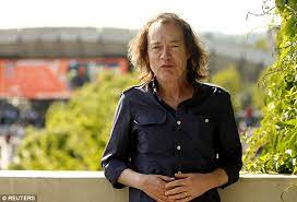 Ac/dc icon calls out stunning angus young lie. Ac Dc S Angus Young Meets Roger Federer At The French Open Daily Mail Online