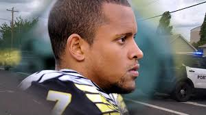 High school coach hailed as a hero after tackling armed student