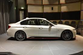 mw abu dhabi dealerships shows a bmw f30 3 series with bmw m performance parts and a tuning chip the look of this f30 335i bmw car models bmw bmw classic cars