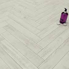 Prestige Herringbone True White 8mm Laminate Floor In 2020 Herringbone Laminate Flooring Laminate Flooring Flooring
