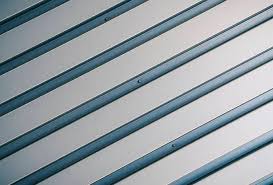 Abstract bright diagonal stripes texture in gradated teal background. Stripes Free Textures
