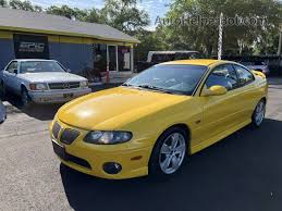 Image result for Yellow 2004 Pontiac