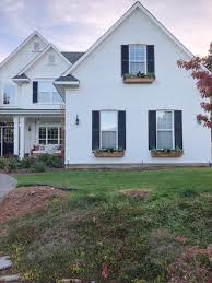 Black And White Brick Paint Painted White Brick Home Diy Planter Boxes Black Shutters Lady S Little Loves Home Exterior Makeover White Brick Houses White House Black Shutters