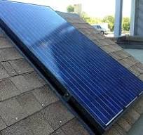 Check out this idea for a non-penetrating, sloped-roof ...