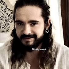 Tom Kaulutz Holding His Dady