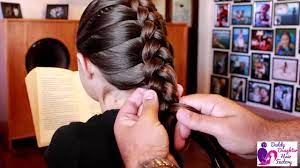 Then, on the unpinned side, gather three separate sections of hair at the crown of the head. Dutch Braid Tutorial By Daddy Daughter Hair Factory Youtube