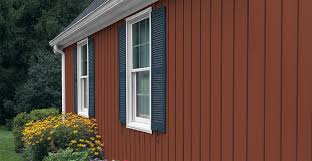 As with horizontal siding, when installing vertical siding, it is necessary to install several accessories first, including corner posts and window, door, and roof trim. Alside Board Batten Vertical Vinyl Siding