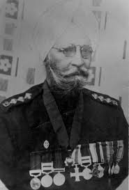 My great great great grandfather, Colonel Bahadur Jawala Singh Hundal is  the man in the front centre, he served in the 1878 Afghan War. He was also  the superintendent of Harmandir Sahib