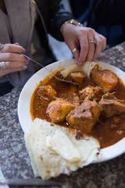 Traditional Chicken Curry And Rotis In Durban African Cooking Spicy Recipes South African Recipes