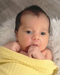 Can someone help fix the swaddle and add a headband?