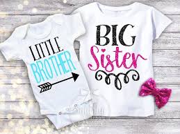 Family taking a selfie with a top view of two little kids, brother and sister drawing with pencils, lying on the floor while young parents they wear jeans and white shirts. Little Brother Big Sister Shirt Pack Sister Shirts Sibling Big Sister Shirt Sibling Shirts