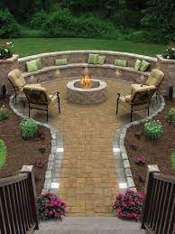 Pick a spot for your fire pit (ensuring that it is located a safe distance from any structures, bushes or trees) and insert a stake in the ground where the center of the pit will be. 74 Amazing Fire Pit Ideas 37 Is Stunning