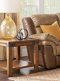 Also know, how high should a sofa table be in comparison to the sofa? End Table Height How Tall Should An End Table Be