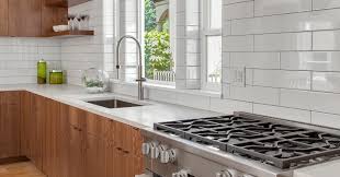 White inset cabinets, quartzite countertops, subway tile and nickel accents provide a traditional feel. Is Subway Tile Still Timeless Everything You Need To Know