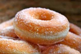 Just watching it will make your sweet tooth ache. Perfect Yeast Doughnuts Sugar And Filled With Jam Nutella And Cream