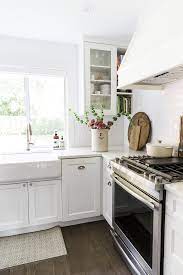 Single bowl kitchen sink with pfister bridge faucet in stainless and drain. How To Clean A White Apron Front Farmhouse Sink So Much Better With Age