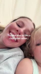 Toddler Captures Heartwarming Moment with Big Sister