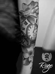 Lotus Clock Tattoo By Ray Benjamin Tattoos Tattoo Blackandgray Hard Tattoos Clock Tattoo Future Tattoo