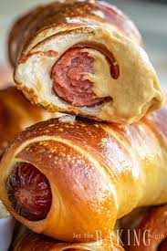Sprinkle the logs with pretzel salt as they come out of the water, to ensure the salt sticks. Pretzel Dog Recipe Let The Baking Begin