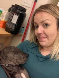 Holding a 10-week-old Great Dane like a baby