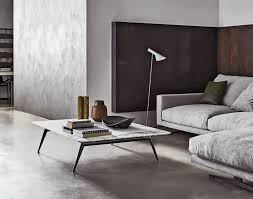 The coffee table is the glue that brings the style and the social aspects of a living room or family room together. Este Coffee And Side Tables Consoles