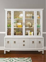 2638828593901326951 White Glossy China Cabinet With Brass Metal Screening Stapled To Back Dining Room Makeover Thanksgiving Dining Room Dining Room Console