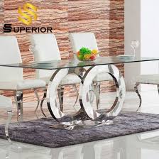 With its chrome legs and glass table top, this table has a modern look and feel, while still being able to fit with any color decor. China Rectangular Transparent Glass Top Dining Room Table Factory Wholesale China Restaurant Table Dining Table Set