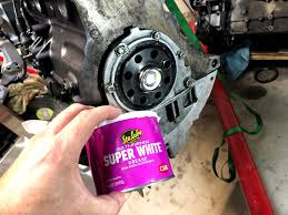 When it bottoms out at the far end the small barbs on the tip of the rod which were compressed on the way into the bearing will snap open and grab the back side of the bearing. Bmw E36 Clutch Installation With Pilot Bearing Replacement Brent Ford Racing