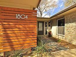 It may look like wallpaper at first glance, but weldtex is actually a decorative form of mid century paneling, developed by donald deskey in 1940. Pin By Jess On Outdoors Mid Century Modern Exterior Modern Exterior Mid Century Modern House