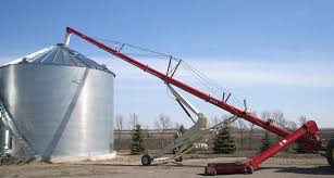 En a diagonal grain auger assembly is disposed within the rear bogey and transfers grain from at least the front area of the rear bogey into the grain unload arm. Maintain Augers And Create Safe Work Zones To Prevent Entanglements The Andersons