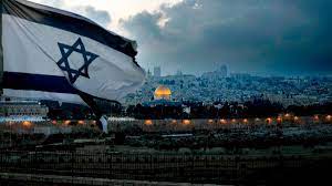 Israeli flags unfurled in old jerusalem with western wailing wall and dome of the rock mosque in background. How Israel Is Working To Remove Palestinians From Jerusalem The National